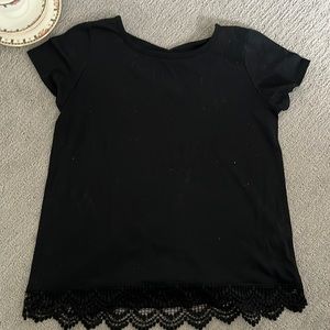 Black blouse with cross back and lace trim